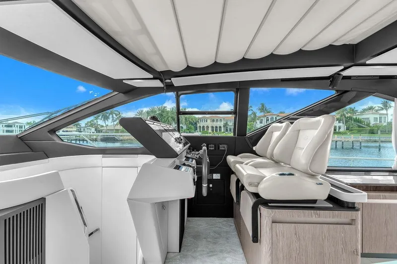 Slide: The Image of Interior of 2020 Azimut S7 FLY yacht with luxurious seating and panoramic windows. - 52