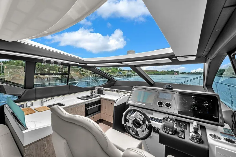 Slide: The Image of Luxurious 2020 Azimut S7 FLY yacht cockpit with modern controls and panoramic views. - 56