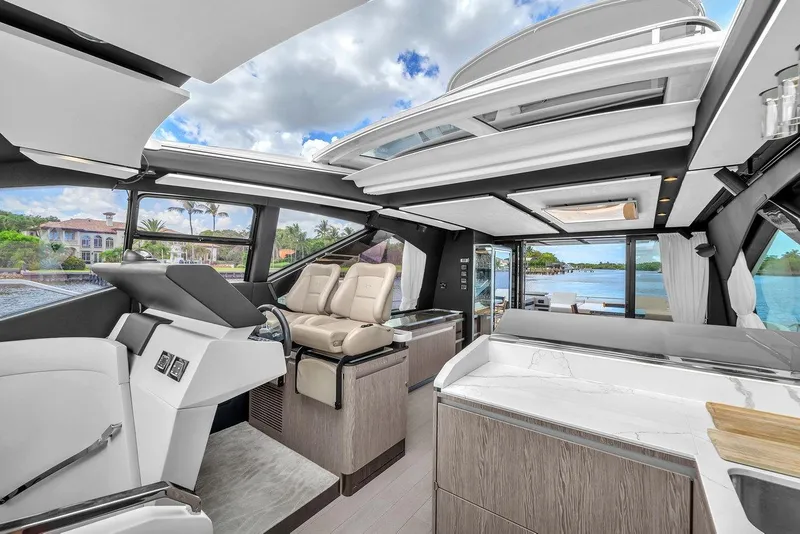 Slide: The Image of Luxurious interior of 2020 Azimut S7 FLY yacht with modern design and scenic water views. - 57