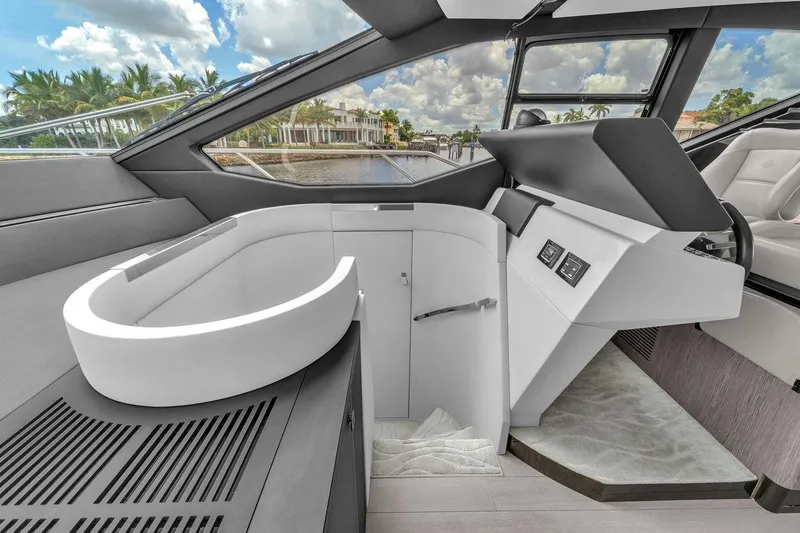 Slide: The Image of Luxurious interior of 2020 Azimut S7 FLY yacht with modern helm and panoramic windows. - 58