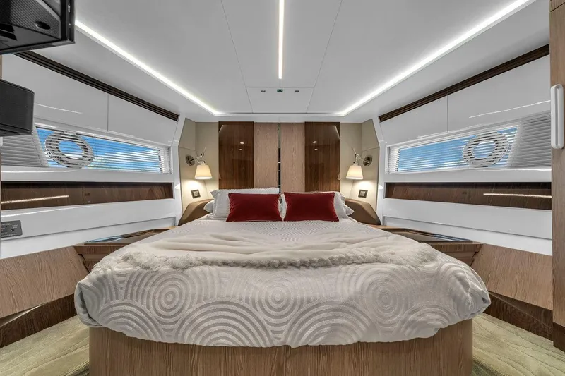 Slide: The Image of Luxurious bedroom interior of 2020 Azimut S7 FLY yacht with modern design and cozy bedding. - 61