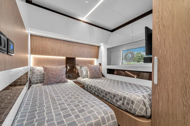 Slide: The Image of Luxurious interior of 2020 Azimut S7 FLY yacht with twin beds and modern decor. - 66