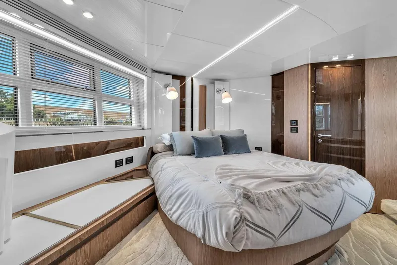 Slide: The Image of Luxurious bedroom interior of 2020 Azimut S7 FLY yacht with modern design and cozy bedding. - 74