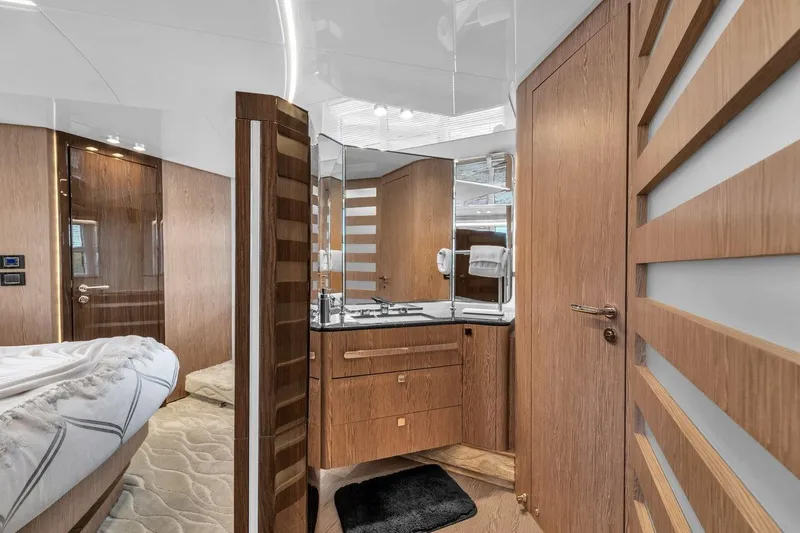 Slide: The Image of Luxurious interior of 2020 Azimut S7 FLY yacht featuring elegant wood finishes and modern design. - 75