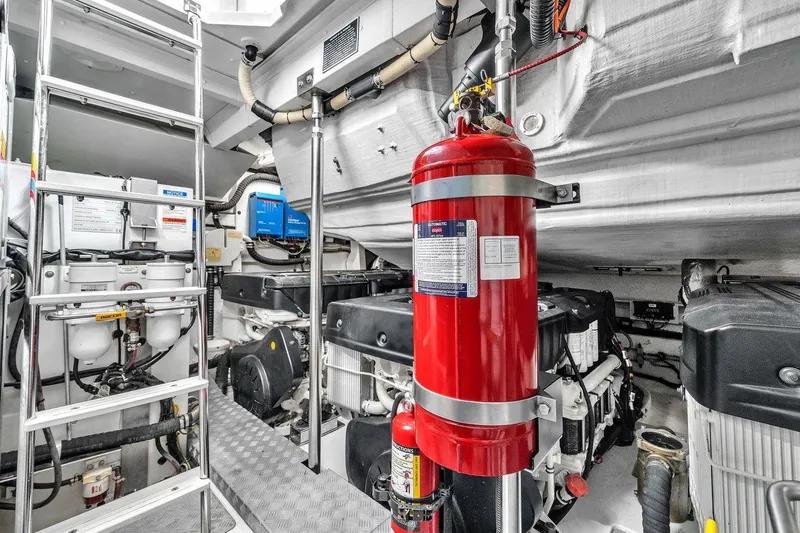 Slide: The Image of Engine room of 2020 Azimut S7 FLY yacht with fire extinguisher and equipment. - 81