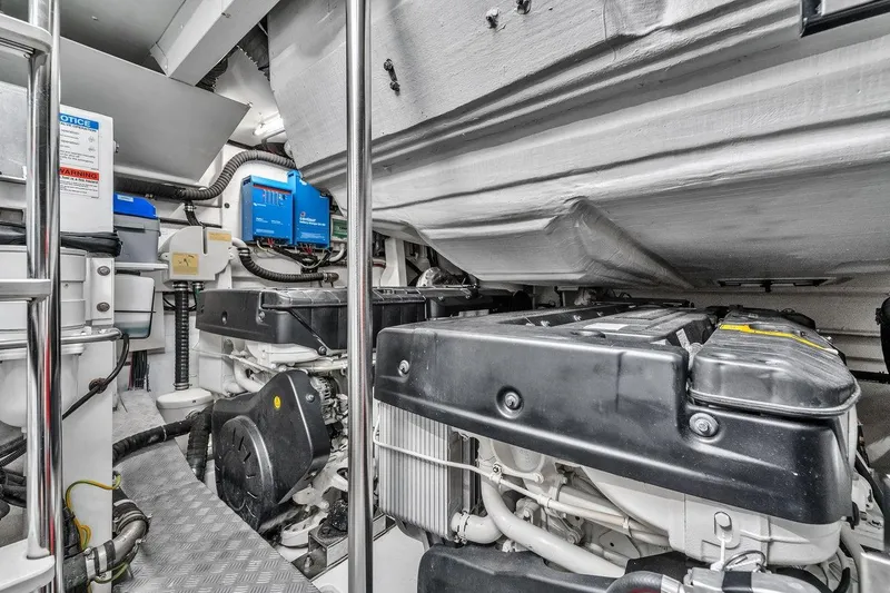 Slide: The Image of Engine room of 2020 Azimut S7 FLY yacht, showcasing mechanical components and equipment. - 82