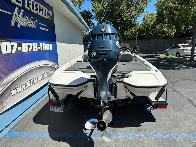 Slide: The Image of 2004 Stratos 285 PRO XL DC boat with outboard motor, parked at GF Marine. - 9