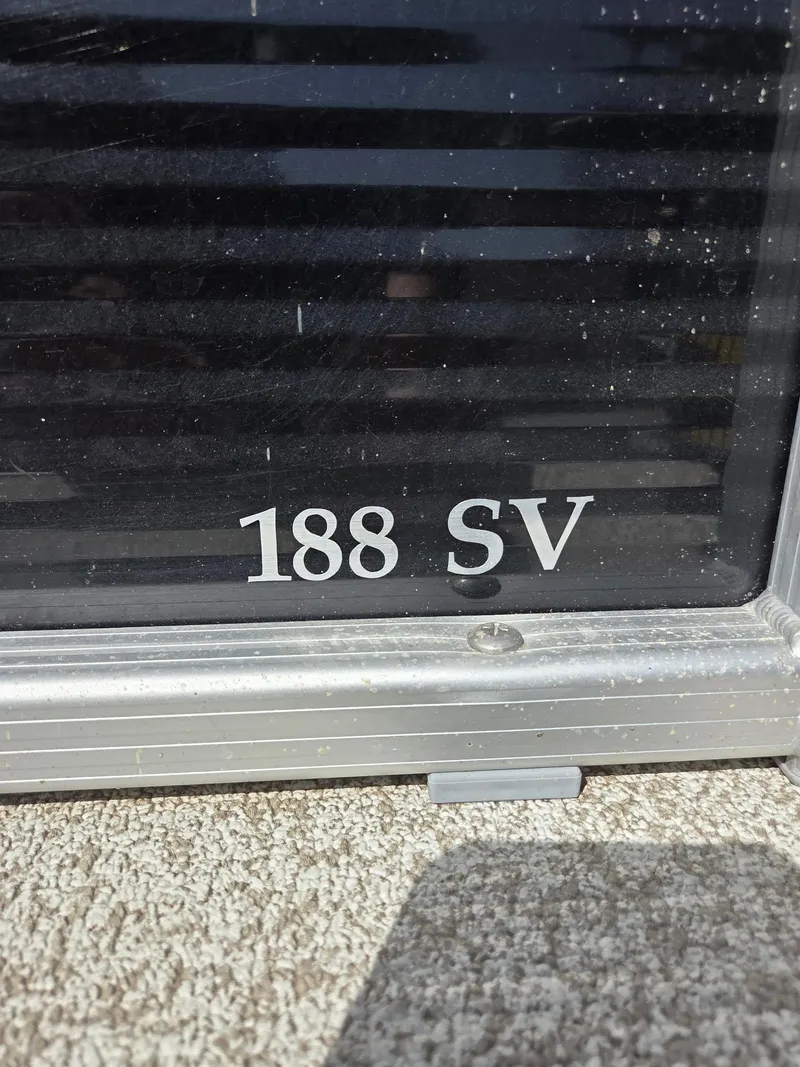 Slide: The Image of Close-up of 2019 Bennington SV 188 SV model nameplate on boat exterior. - 1