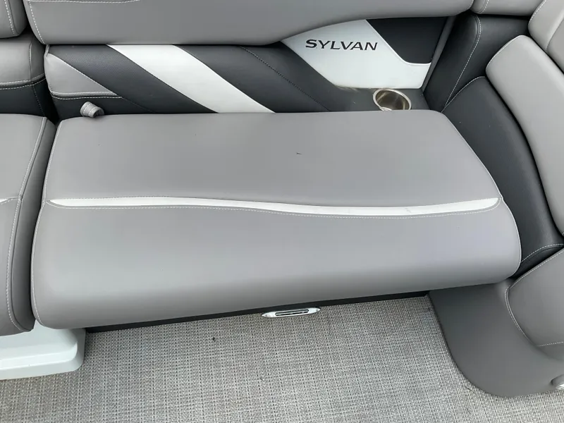 Slide: The Image of Gray leather seating on 2019 Sylvan SE-CRS25 boat, featuring sleek design and cup holder. - 11