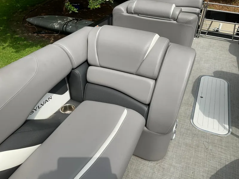 Slide: The Image of Gray seating on a 2019 Sylvan SE-CRS25 boat, featuring sleek design and comfortable upholstery. - 12