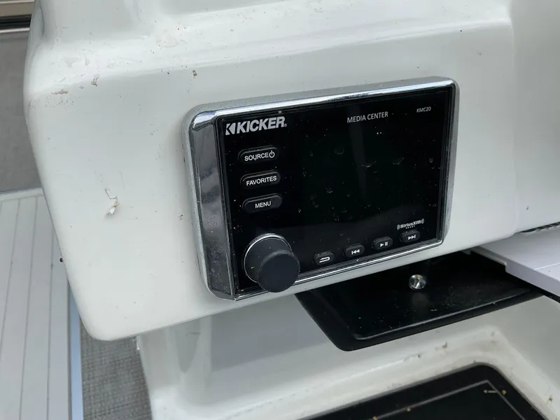 Slide: The Image of Kicker media center on 2019 Sylvan SE-CRS25 boat dashboard. - 24