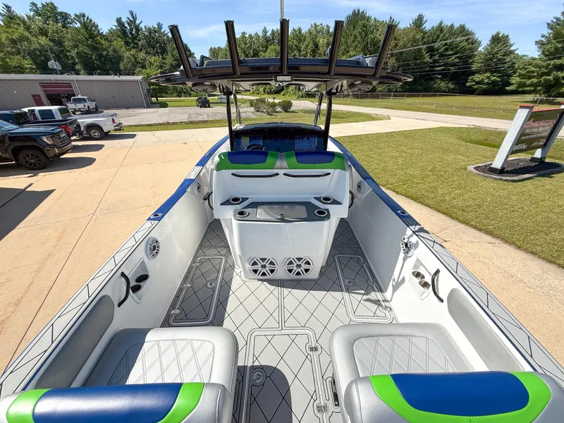 Slide: The Image of 2018 Sunsation 32 CCX boat interior with modern seating and sleek design. - 3