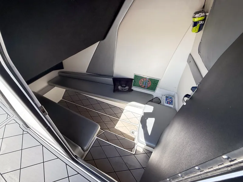 Slide: The Image of 2018 Sunsation 32 CCX cabin interior with seating and storage compartments. - 8