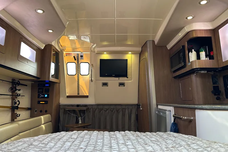 Slide: The Image of Luxurious interior of 2013 Boston Whaler 345 Conquest boat with modern amenities. - 30