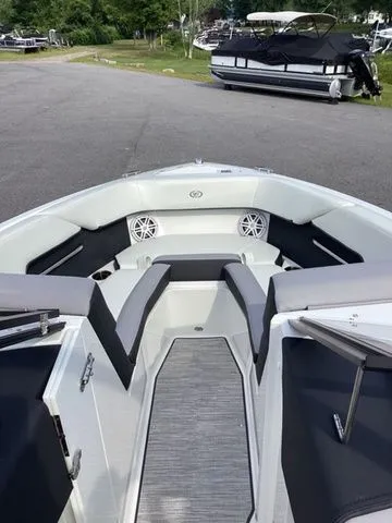 Slide: The Image of 2026 Cobalt CS23 boat interior with sleek seating and modern design. - 13