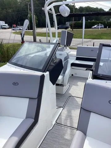 Slide: The Image of 2026 Cobalt CS23 boat interior with modern seating and sleek design. - 15