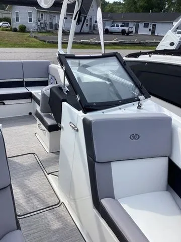 Slide: The Image of 2026 Cobalt CS23 boat interior with modern seating and sleek design. - 16