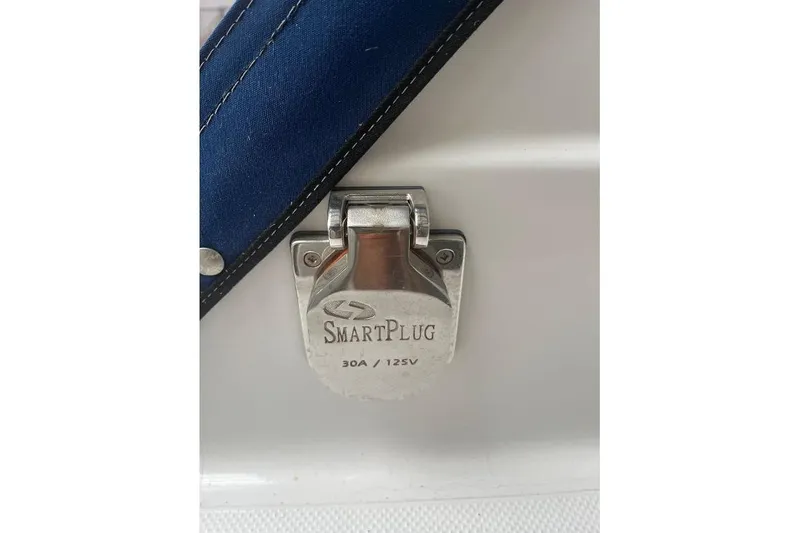 Slide: The Image of SmartPlug 30A/125V outlet on 1976 Uniflite 32 Sport Sedan boat. - 14