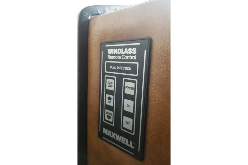 Slide: The Image of Maxwell windlass remote control panel on 1976 Uniflite 32 Sport Sedan boat. - 70