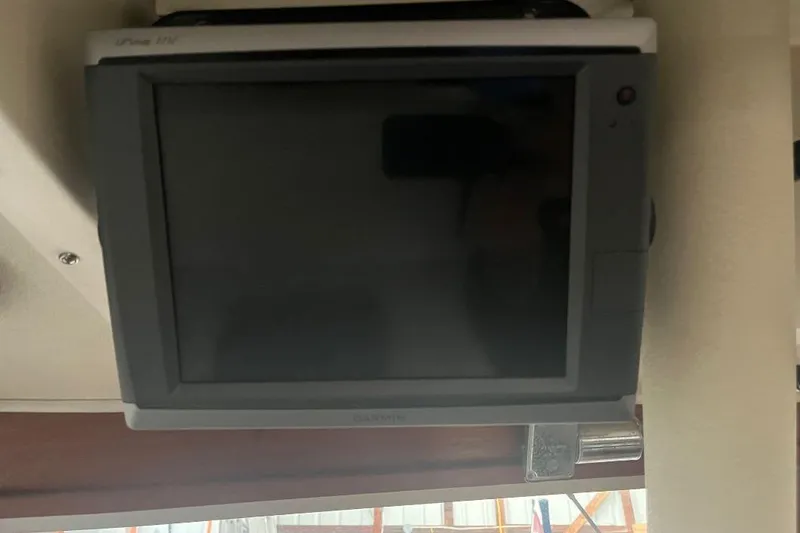 Slide: The Image of Garmin marine display on 1976 Uniflite 32 Sport Sedan boat interior. - 71