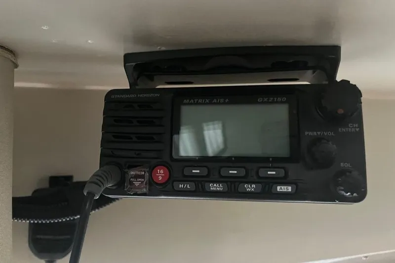 Slide: The Image of Marine radio equipment on a 1976 Uniflite 32 Sport Sedan boat. - 72