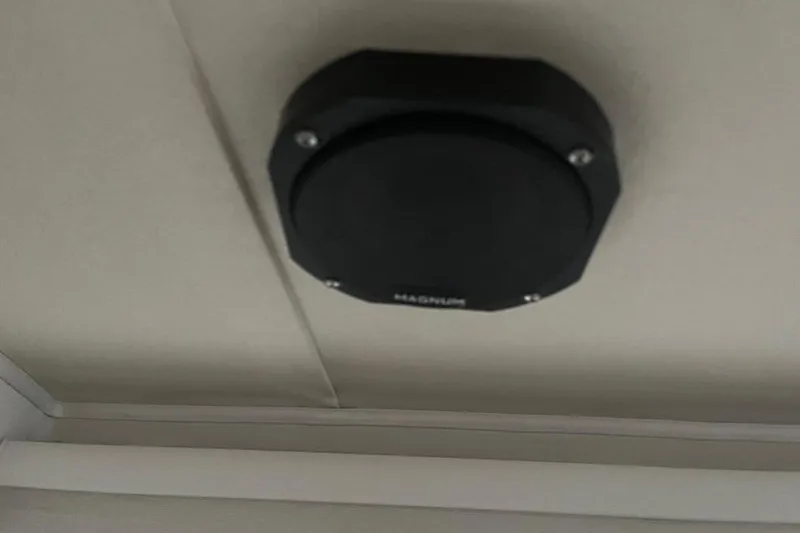 Slide: The Image of Ceiling-mounted speaker on 1976 Uniflite 32 Sport Sedan boat interior. - 73