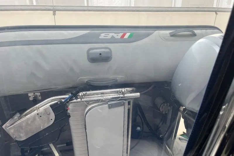 Slide: The Image of Interior view of a 1976 Uniflite 32 Sport Sedan boat, showcasing mechanical components. - 81