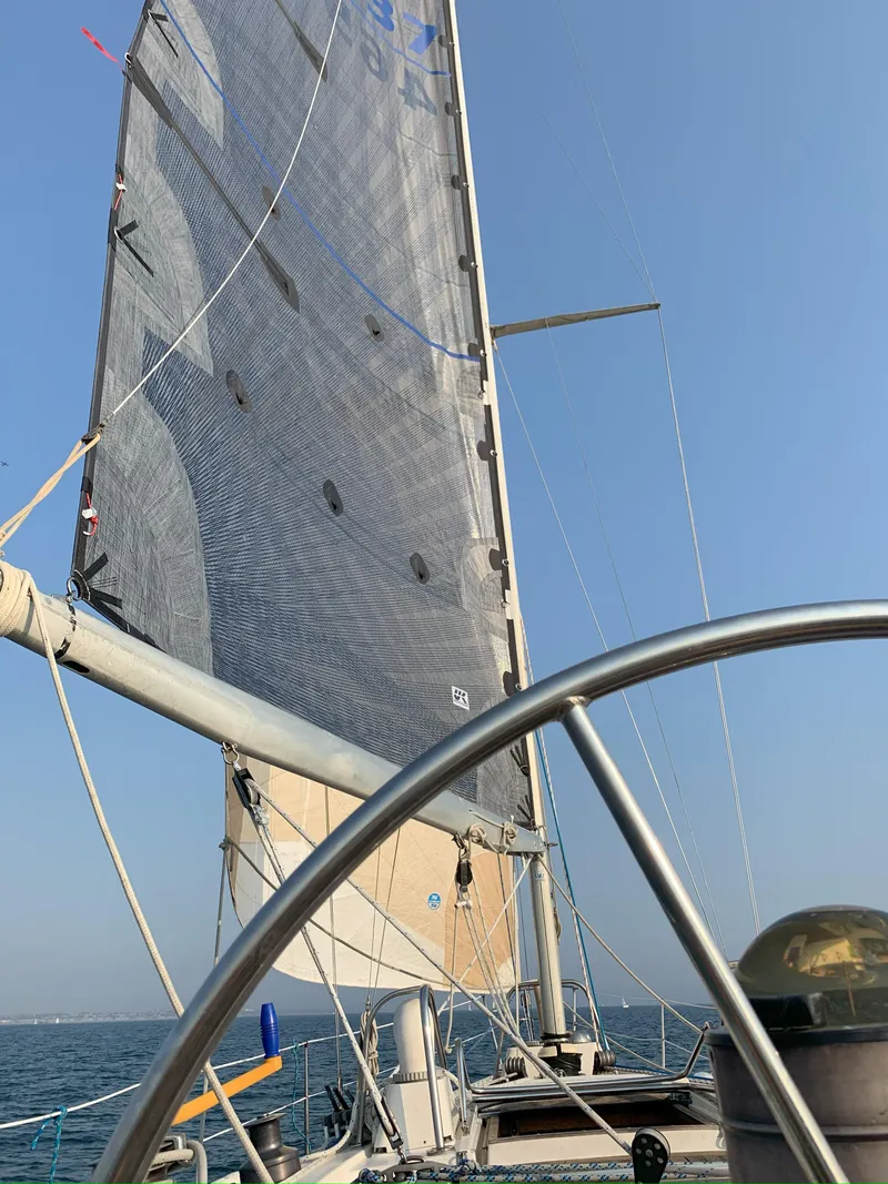 Slide: The Image of Sailing on a 1980 Nautor Swan 371 yacht with clear blue skies. - 29