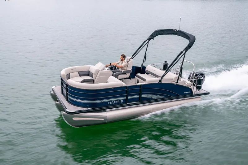 The Image of 2026 Harris Cruiser 190 pontoon boat on calm water. - 0