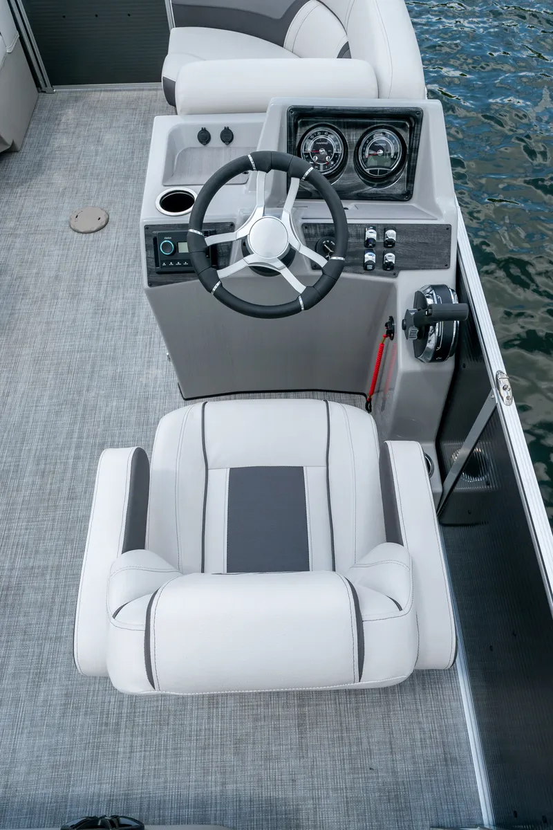 Slide: The Image of Steering console of Harris Cruiser 190 pontoon boat, year 2026. - 14