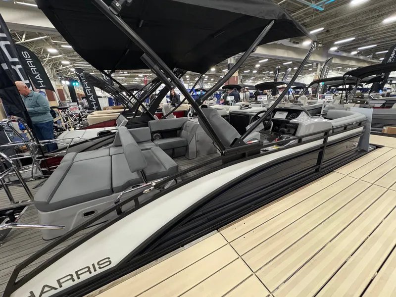 Slide: The Image of Harris Solstice 230 pontoon boat 2026 at a boat show. - 42
