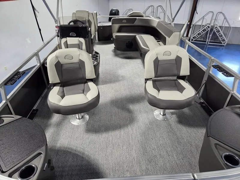 Slide: The Image of 2026 Sun Tracker BB 18 DLX pontoon boat interior with plush seating and modern design. - 15