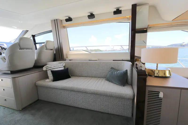 Slide: The Image of Luxurious interior of 2020 Azimut 55 yacht with elegant seating and scenic ocean view. - 5