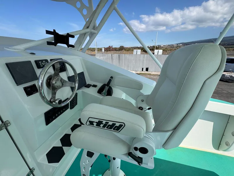 Slide: The Image of Custom 2018 Ocean Master boat helm with steering wheel and Stidd captain's chair. - 19