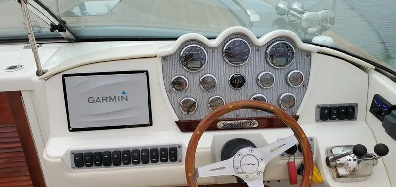Slide: The Image of Dashboard of a 2010 Chris-Craft Corsair 28 boat with Garmin navigation system. - 5