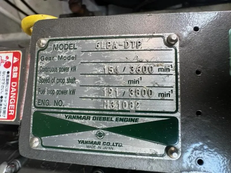 Slide: The Image of Yanmar diesel engine plate, model 6LPA-DTP, specifications visible, Carolina Classic 28, 2005. - 16