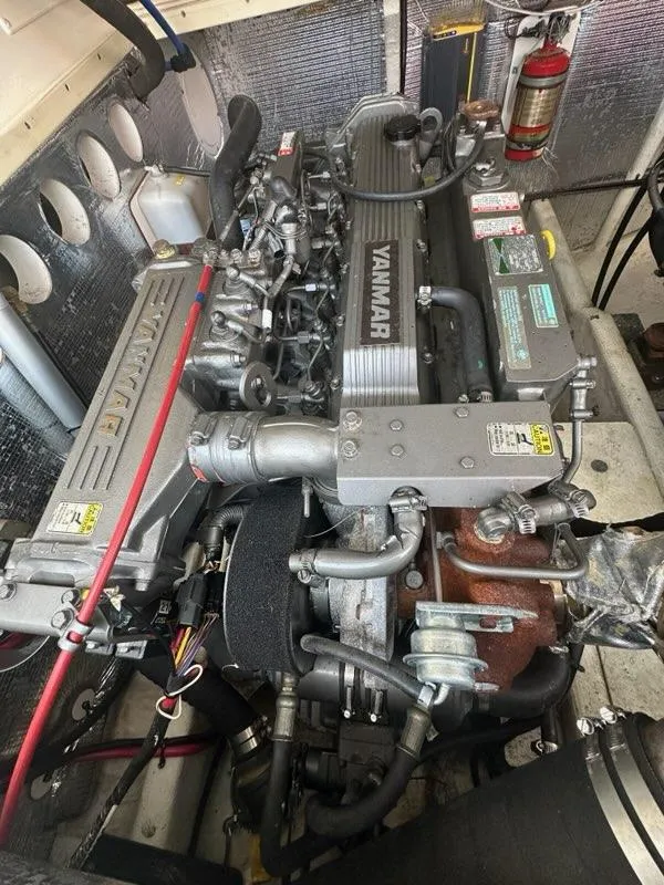 Slide: The Image of Engine compartment of a 2005 Carolina Classic 28 boat with Yanmar engine. - 17