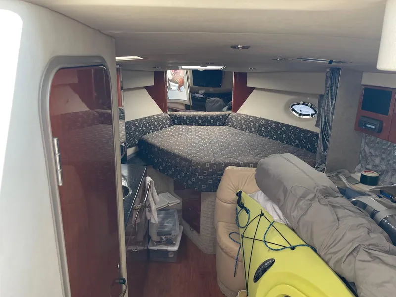 Slide: The Image of Interior of a 2008 Formula 31 PC boat with a cozy sleeping area. - 13