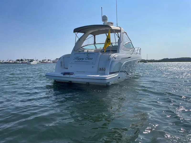 Slide: The Image of 2008 Formula 31 PC boat on water, sunny day, rear view. - 8