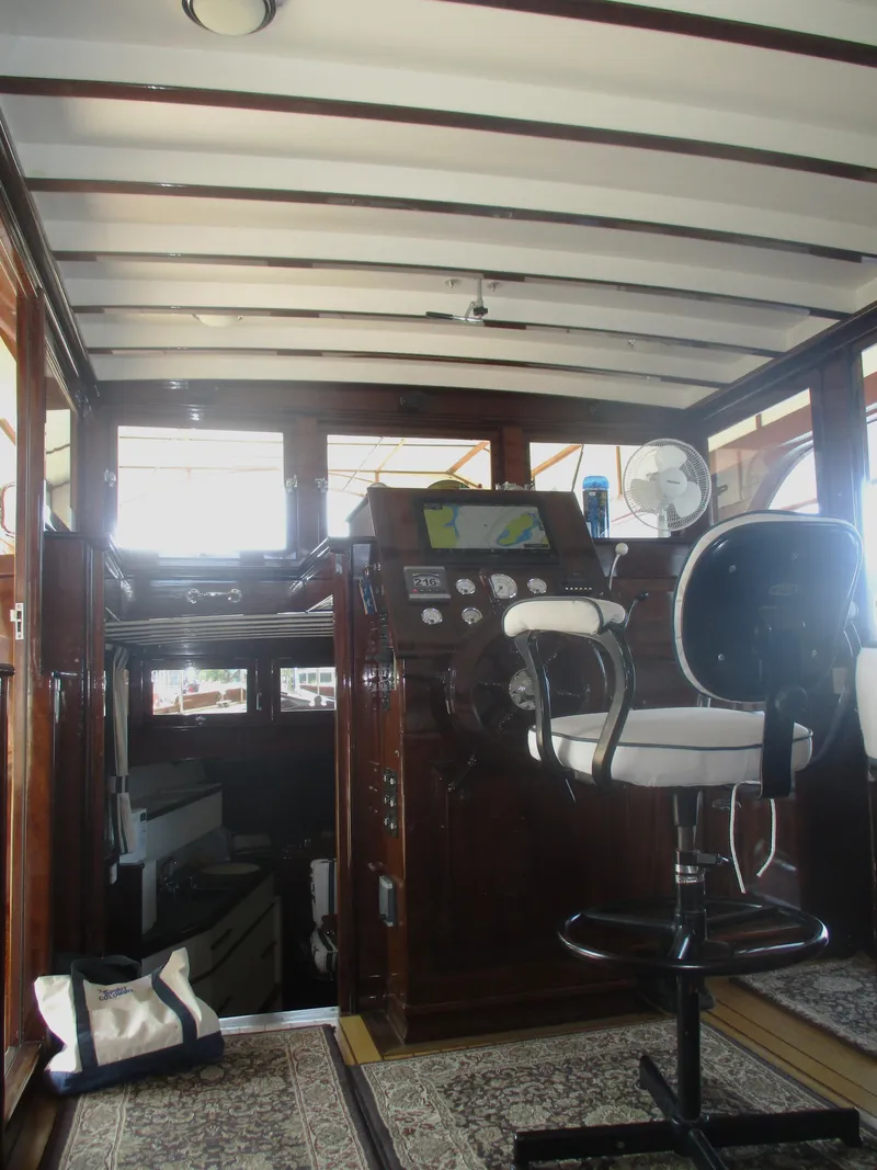 Slide: The Image of Interior of 1929 Vintage Gidley 52 Retro Modern Motor Yacht with classic helm and seating. - 10