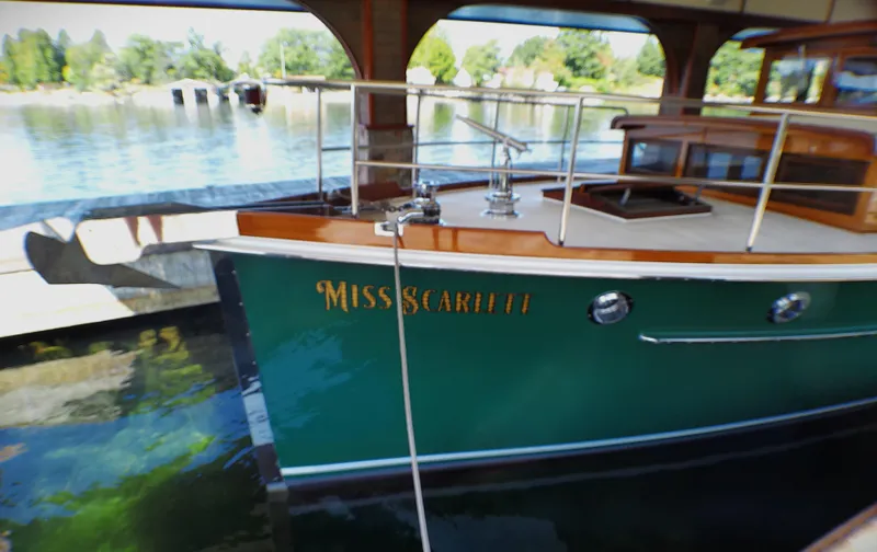 Slide: The Image of Vintage 1929 Gidley 52 Retro Modern Motor Yacht "Miss Scarlette" docked by serene waters. - 13