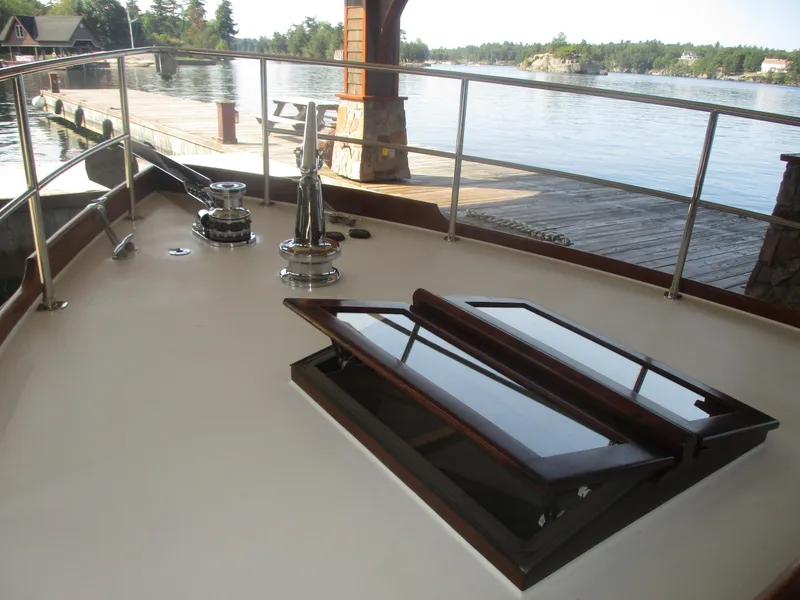 Slide: The Image of Vintage 1929 Gidley 52 Retro Modern Motor Yacht deck with scenic waterfront view. - 18