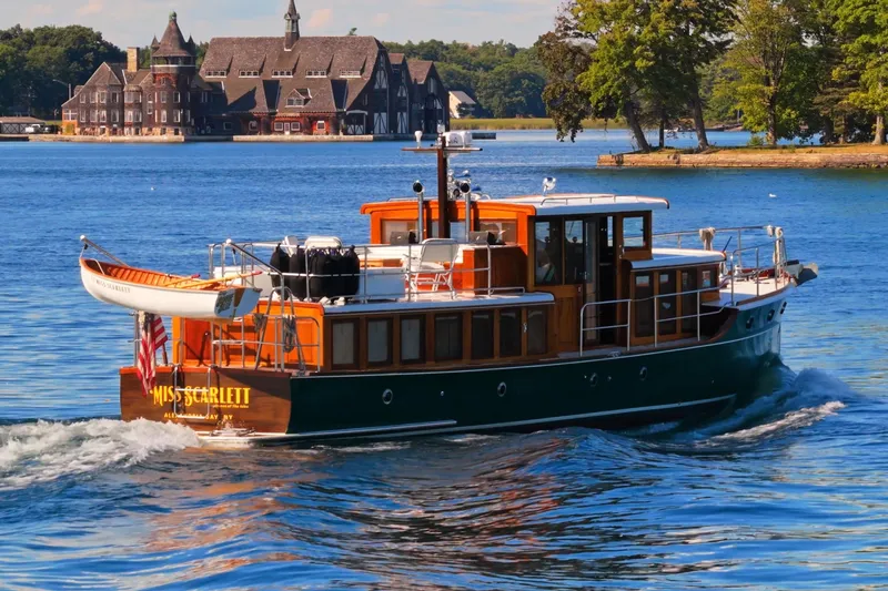 Slide: The Image of Vintage 1929 Gidley 52 Retro Modern Motor Yacht cruising on a scenic lake. - 2