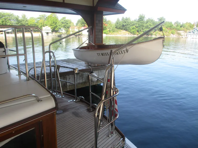 Slide: The Image of Vintage 1929 Gidley 52 Retro Modern Motor Yacht docked with small boat on davit. - 24