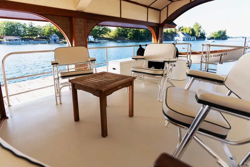 Slide: The Image of Vintage 1929 Gidley 52 Retro Modern Motor Yacht interior with elegant seating and scenic water view. - 36