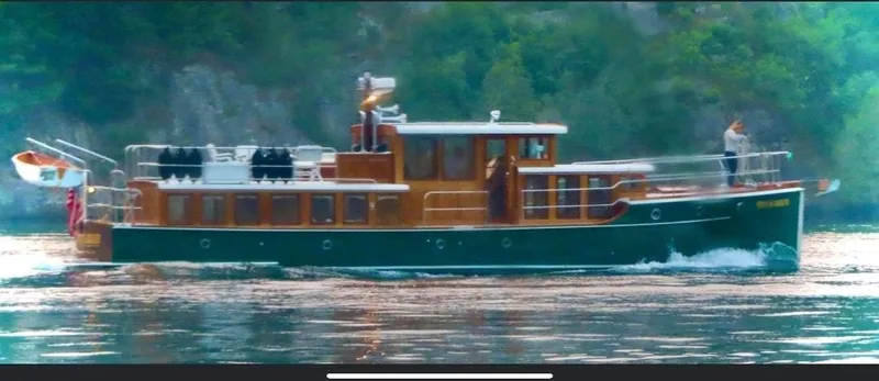 Slide: The Image of Vintage 1929 Gidley 52 Retro Modern Motor Yacht cruising on a serene lake. - 6