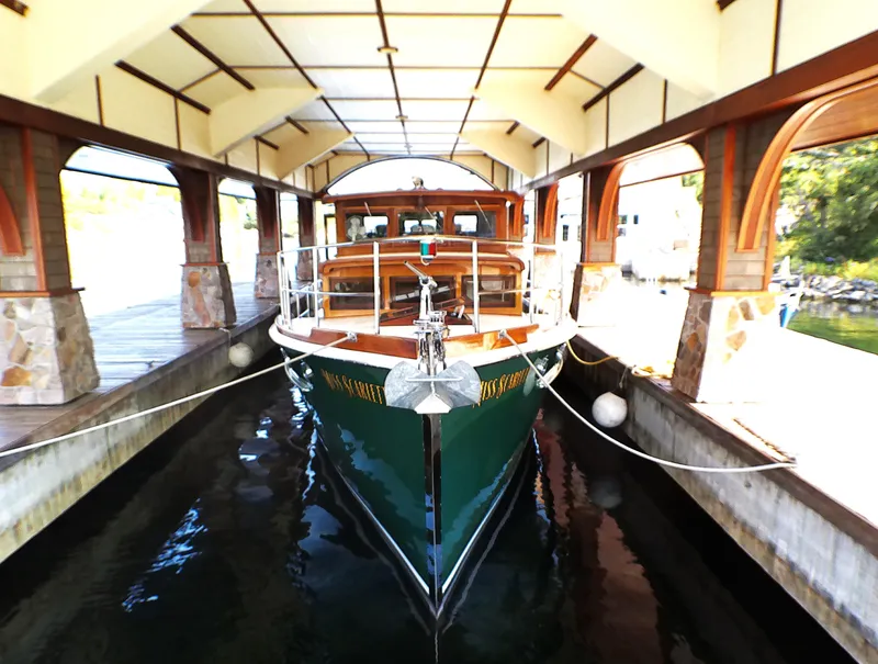 Slide: The Image of Vintage 1929 Gidley 52 Retro Modern Motor Yacht docked in covered marina. - 9