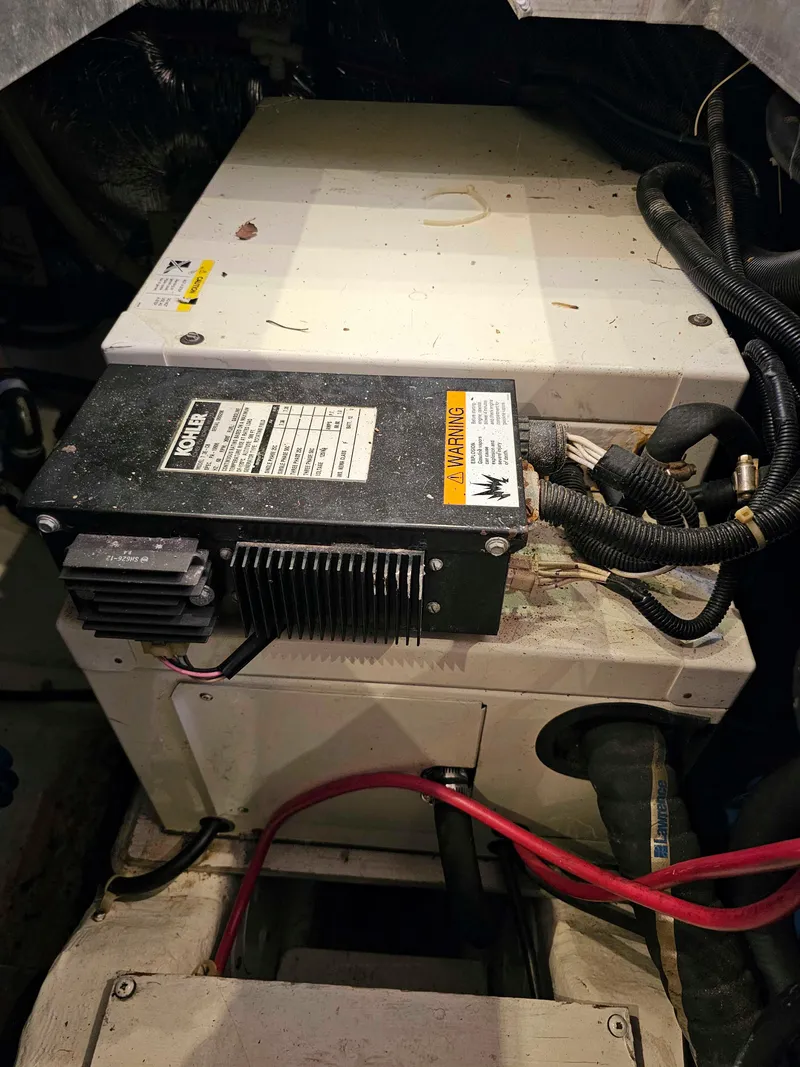 Slide: The Image of Engine room of 2000 Carver 356 Aft Cabin Motor Yacht with Kohler generator. - 29