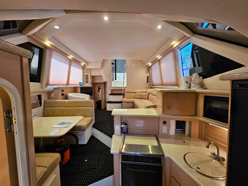 Slide: The Image of Luxurious interior of 2000 Carver 356 Aft Cabin Motor Yacht with modern amenities. - 15