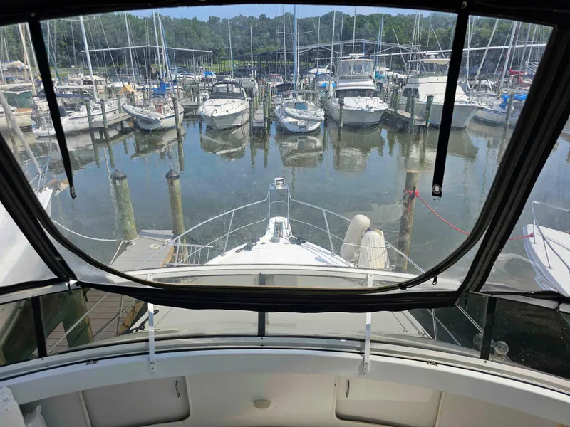 Slide: The Image of View from Carver 356 Aft Cabin Motor Yacht, 2000, overlooking marina with docked boats. - 6